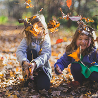 Children playing with leaves Children playing with leaves