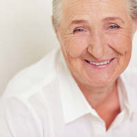 Elderly lady smiling at the camera Elderly lady smiling at the camera