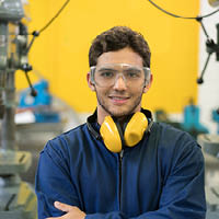 Student in goggles and ear defenders Student in goggles and ear defenders