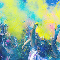people throwing coloured powder in the air people throwing coloured powder in the air