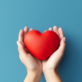 Person holding a loveheart Person holding a loveheart
